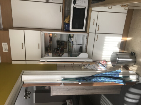 Keuken met ingebouwde ijskast, elektrisch kookvuur